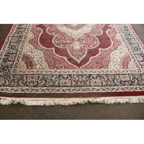 83 - Isfahan rug with red ground 240cm x 320cm (note wear)