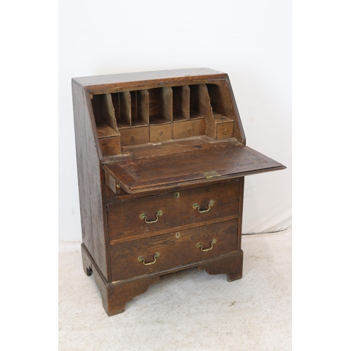 170 - An oak bureau measuring approx. 74W x 46D x 108cmH