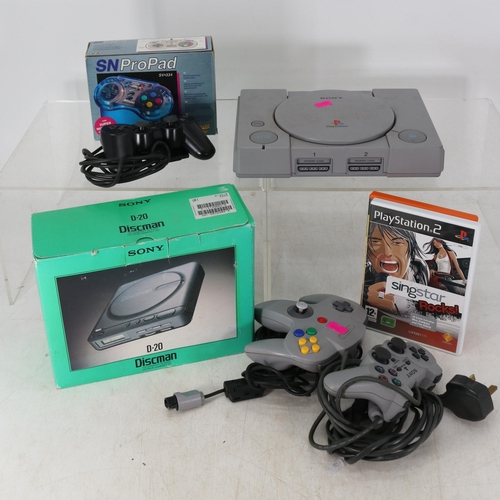 224 - Sony PSP console in original box and packaging together with four games together with two nintendo D... 