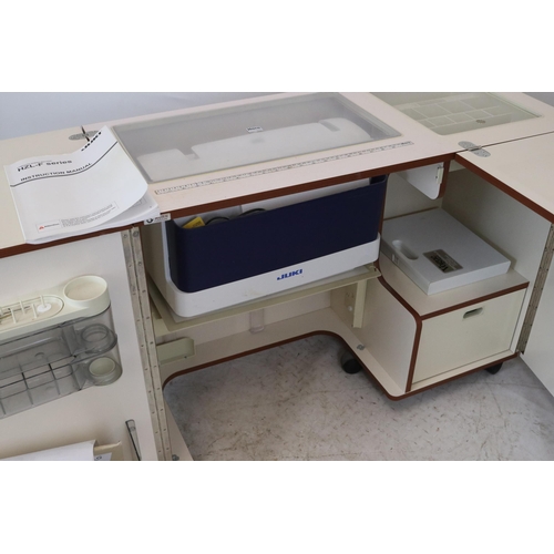 244 - Horn Furniture Monarch MKll sewing cabinet with contents to include Juki HZL-F series computer sewin... 