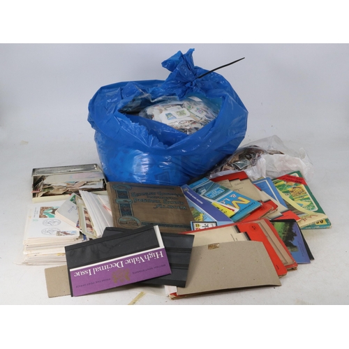 253 - Large quantity of stamps on envelopes/kilo ware rummage box