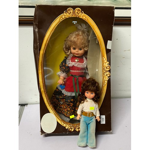 266 - Koniigseer, boxed doll together with a boxed porcelain doll and two others