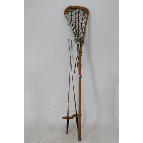 338 - Quantity of vintage tennis rackets, Le cros stick and a pair of decorative fencing swirds