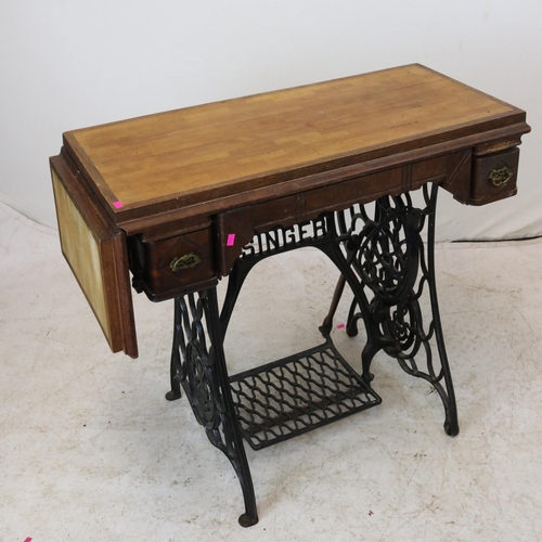 400 - A Singer wrought iron treadle with butchers block top, (no sewing machine)