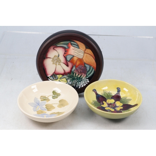 57 - Three Moorcroft small dishes approx. 11cm in Companula, Columbine and Golden Jubilee, fully marked u... 