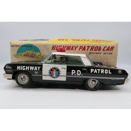 70 - Highway Patrol battery operated tin plate police car