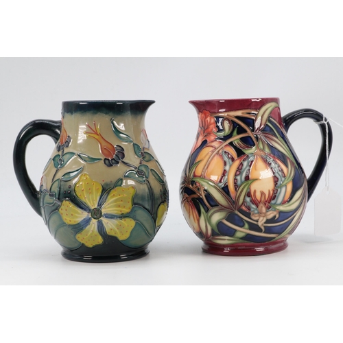 84 - Two Moorcroft trial pieces both showing repairs on the handles