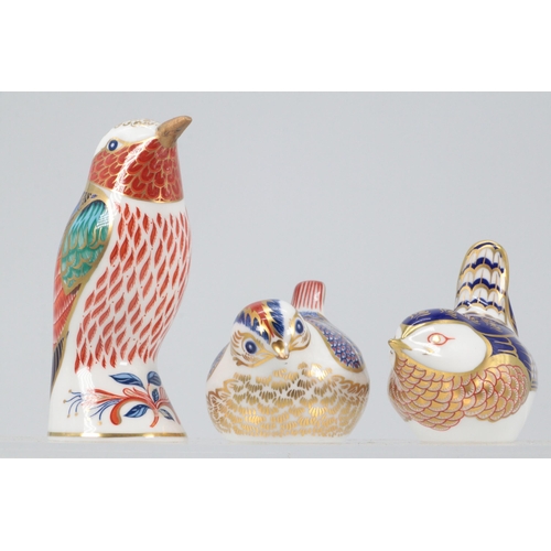 84 - Three Crown Derby bird paperweights to include one gold stopper, one silver stopper and one with a b... 