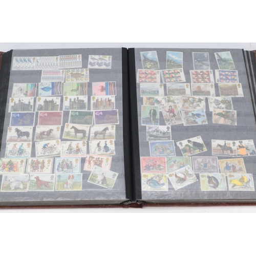 285 - A Windsor Great Britain stamp album including Penny Reds, all through to ERII, stock book including ... 