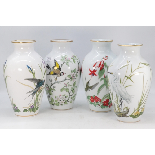 315 - Four Franklin porcelain vases to include meadow land, Woodland, The Garden, and The Marshland bird v... 