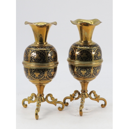 81 - A pair of Brass urns with enamel decoration (examine)