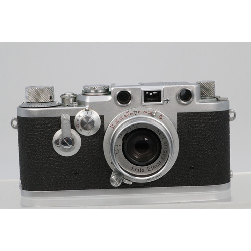 69D - Leica DBP Earnest Litz camera in leather case fitted Litz Elmar F=5cm 1:3.5 lens and a Leica manual ... 