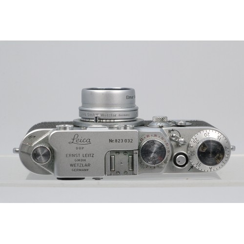 69D - Leica DBP Earnest Litz camera in leather case fitted Litz Elmar F=5cm 1:3.5 lens and a Leica manual ... 