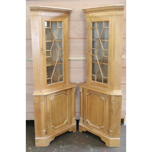 60 - A pair of Pine corner display cabinets. They measure approx. 58 x 58 x 118cmh