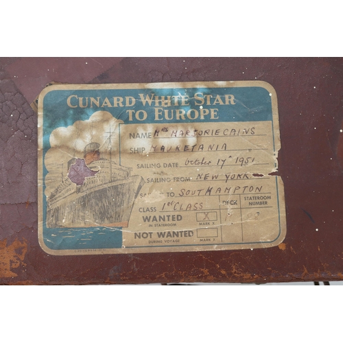 114 - Small travel suitcase with a Cunard White Star shipping label together with local interest books and... 