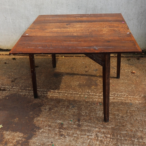 117 - Rustic plank top drop leaf table measures approx. W48cm x D110cm (extended 133cm) x H73cm