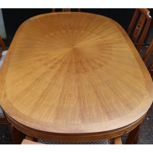 198 - Dining table and leaves together with 8 dining chairs (six chairs shown) measures approx. with two l... 