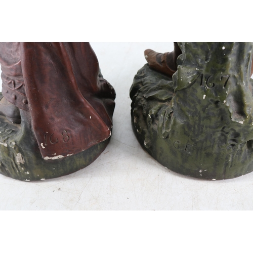 251 - Two ceramic water carrier figures measuring approx. 65cm tall (inspect)