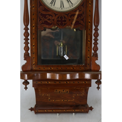 257 - Wall clock with decorative inlay to the body (inspect)