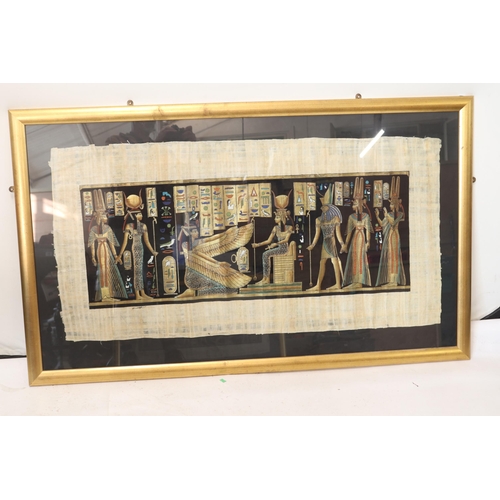 275 - Two large framed Egyptian paintings on Papyrus (largest measures approx. in frame 146cm x 86cm)