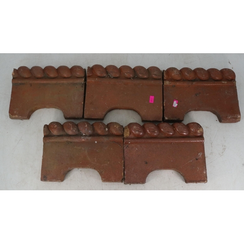 25C - Approx. 34 rope-top terracotta edging tiles, each measuring 9