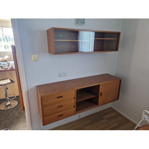 101 - Tapley? midcentury wall unit with three drawers and two sliding cupboards together with similar two ... 