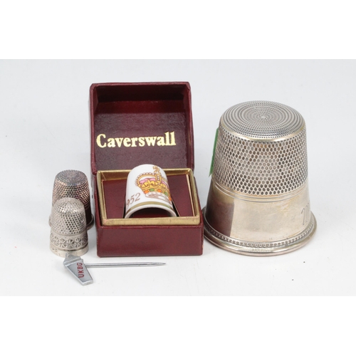 26 - Charles Horner silver thimble, another sterling thimble, a thimble/liquor shot cup