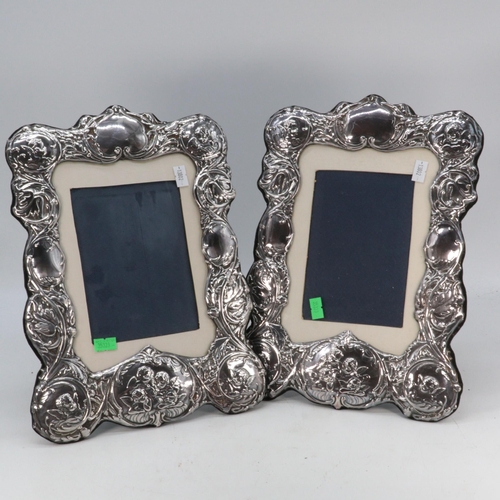 32 - Pair of silver hallmarked cherub frames assay marks 1993, measure approx. 32cm each