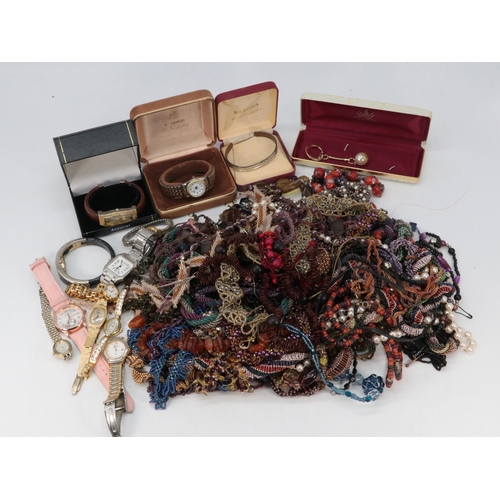 329 - A good quantity of assorted costume jewellery and wristwatches