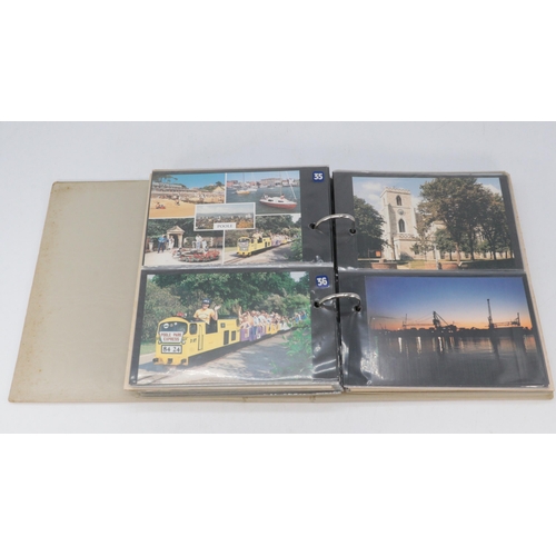 354 - Two albums of Bournemouth and surrounding area coastal scenes postcards