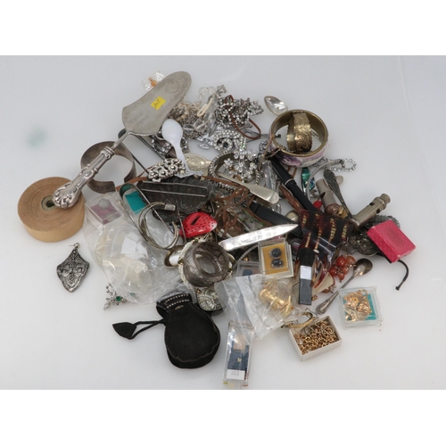 335 - A large quantity of assorted costume jewellery, plated flatware, curio items, flatware, all sort