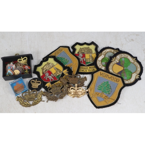 17 - Selection of enamel pin badges together with a number of cloth patches