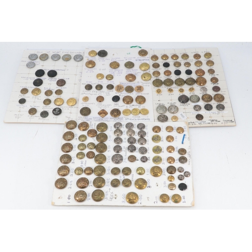 32 - Large quantity of military buttons mounted on board