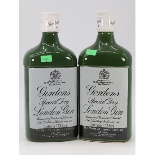 104 - Two ceramic Gordon's gin mixers bottles