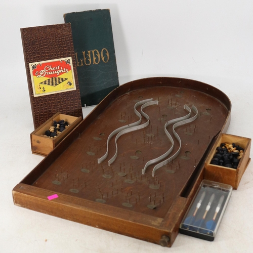 154 - Bagatelle board, two chess sets, Ludo board together with a set of darts