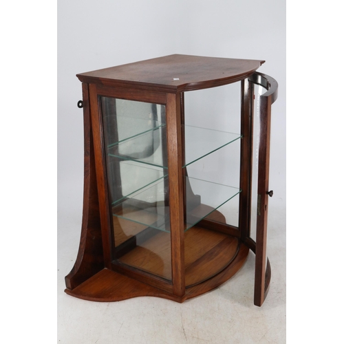 195 - Wall mounted display cabinet with curved glass front and mirrored back measures approx. 64cmW x 35cm... 