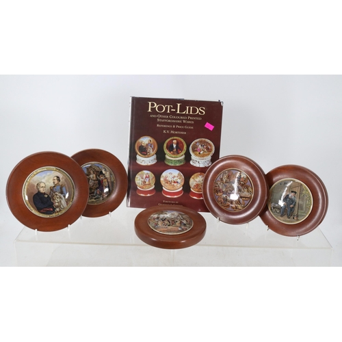 218 - Five framed pot lids together with a pot-lids book by K V Mortimer