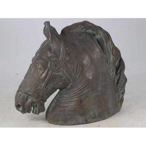 15 - Patinated bronzed finish sculpture in the form of a horses head measures approx. 31cm tall