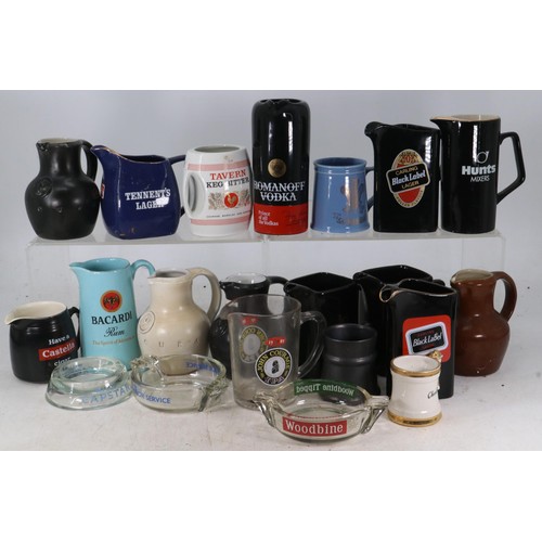 85 - A good quantity of Pub/Brewery advertising jugs