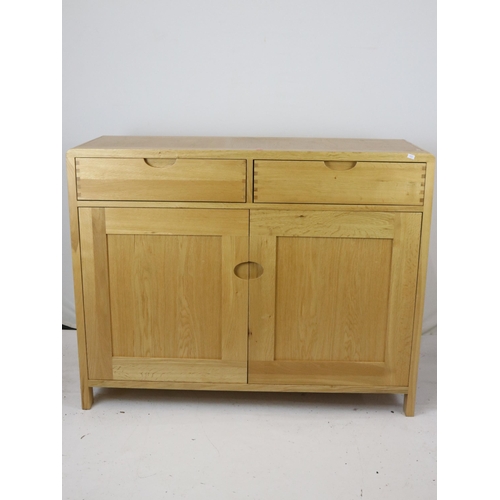 279 - Ercol two drawer side board measures approx. 115cmW x 45cmD x 89cmH together with a side table