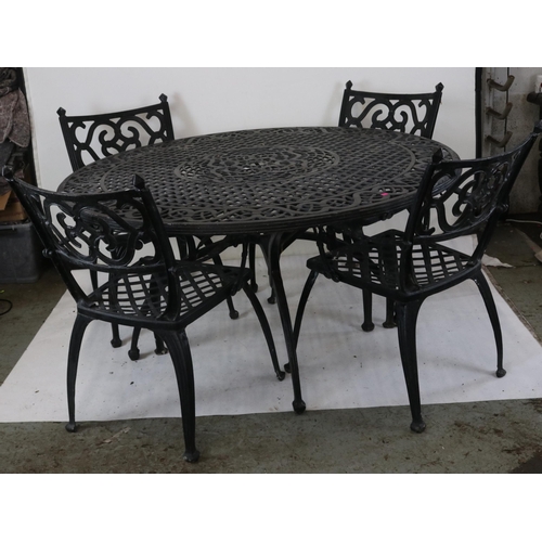 407 - Metal circular garden table together with four chairs table measures approx. 144cmD