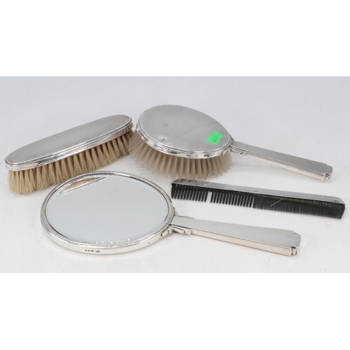 33 - Four piece silver hallmarked vanity set