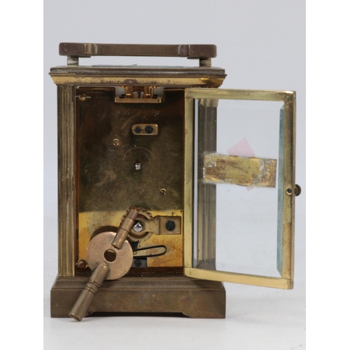 100 - Brass cased Carriage clock with key