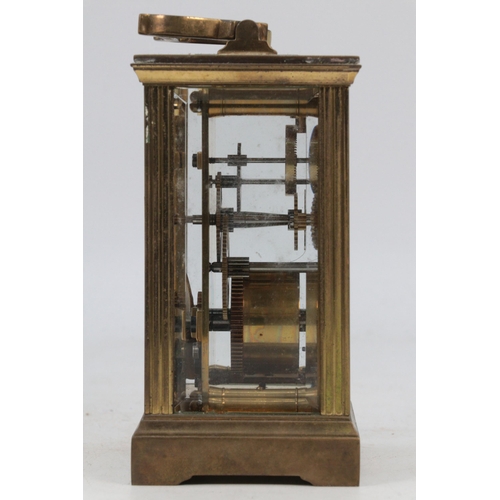 100 - Brass cased Carriage clock with key