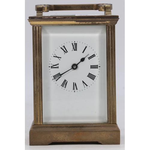 100 - Brass cased Carriage clock with key