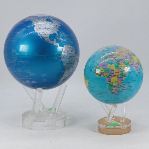 106 - A Mova motion globe on stand together with a smaller Mova world globe