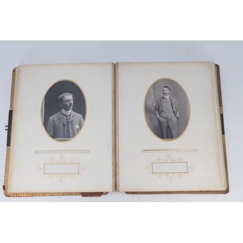 313 - Two Antique photgraph albums with some conents, 1906 Indenture etc