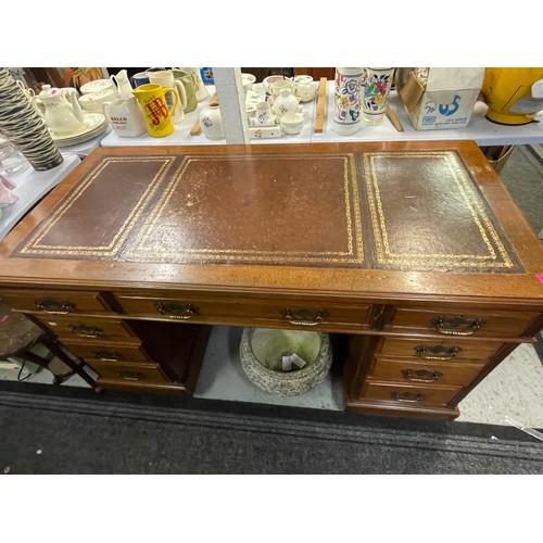 472 - Mahogany early 20c pedestal Desk with inset red leather top.