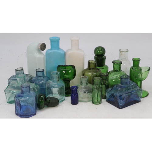 157 - A selection of antique glass bottles to include mouthwash, ink, and others