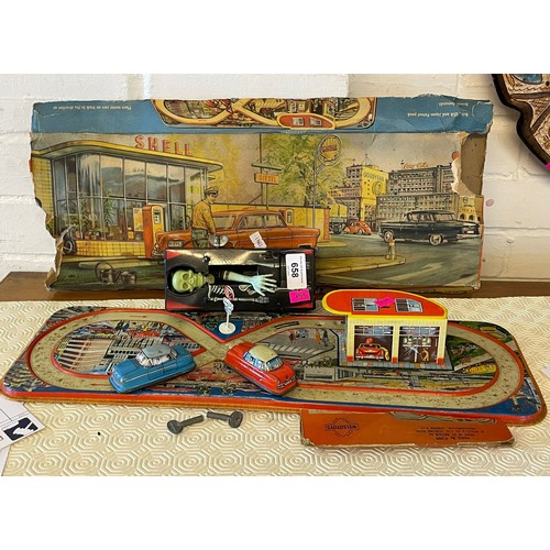 658 - Vintage tinplate car set by Welsotoys, complete with two cars and keys, box is a little tatty and a ... 